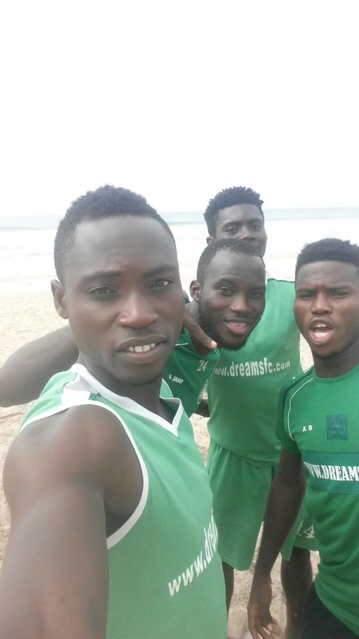 Dreams FC players engage in beach workout following league break