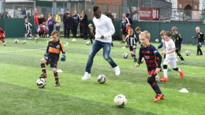 Christian Atsu celebrates World Orphan Day at Soccer School in Newcastle